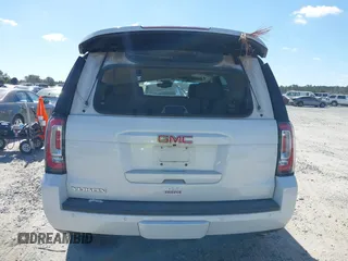 2019 GMC Yukon SLT with VIN 1GKS1BKC9KR332014, listed as a IAAI auction lot 40674460 with 76,545 mi miles. Bid and sale history available at carsss.com. Image 16.
