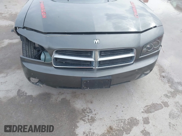 2010 Dodge Charger SXT with VIN 2B3CA3CV0AH234012, listed as a IAAI auction lot 41670267 with 202,182 mi miles and . Bid and sale history available at carsss.com. Image 6.