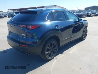 2021 Mazda CX-30 Premium with VIN 3MVDMBDYXMM307047, listed as a IAAI auction lot 41974966 with 53,409 mi miles and . Bid and sale history available at carsss.com. Image 4.