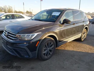 2022 Volkswagen Tiguan SE with VIN 3VV3B7AX1NM083939, listed as a IAAI auction lot 41158579 with 77,111 mi miles. Bid and sale history available at carsss.com. Image 2.