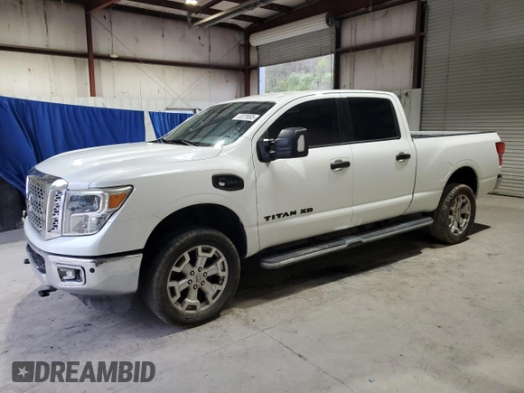 2016 Nissan Titan Platinum Reserve z VIN 1N6BA1F27GN502647, wystawiony jako Copart lot #53079895 z przebiegiem 143 384 mil mil oraz Czysty tytuł • Clean title. Historia ofert i sprzedaży dostępna na DreamBid. Obrazek 1.