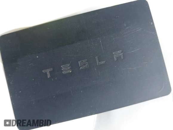 2019 Tesla Model 3 Mid Range with VIN 5YJ3E1EA2KF305834, listed as a IAAI auction lot 41719610 with 126,333 mi miles and . Bid and sale history available at DreamBid. Image 11.