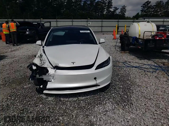 2025 Tesla Model 3 Long Range with VIN 5YJ3E1EA3SF889774, listed as a Copart auction lot 57493425 with 5,167 mi miles and Salvage title. Bid and sale history available at DreamBid. Image 13.