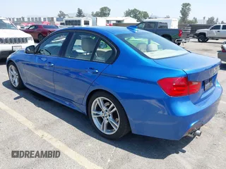 2014 BMW 3 Series 328i with VIN WBA3C1C50EK108824, listed as a IAAI auction lot 42489241 with 102,717 mi miles and . Bid and sale history available at DreamBid. Image 3.