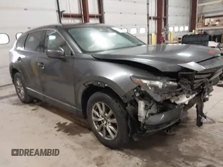 2019 Mazda CX-9 Touring with VIN JM3TCBCY3K0305147, listed as a IAAI auction lot 41676425 with 104,265 mi miles and . Bid and sale history available at carsss.com. Image 1.