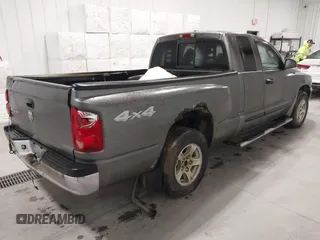 2006 Dodge Dakota SLT with VIN 1D7HW42K36S557656, listed as a IAAI auction lot 41446296 with 97,000 mi miles and . Bid and sale history available at carsss.com. Image 4.