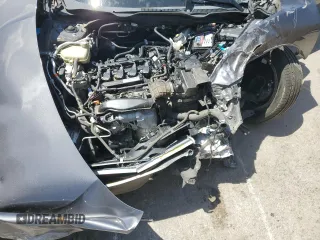 2016 Honda Civic EX-T z VIN 2HGFC3B33GH359702, wystawiony jako Copart lot #54943425 z przebiegiem Nie podano mil oraz Szkoda całkowita • Salvage title. Historia ofert i sprzedaży dostępna na DreamBid. Obrazek 11.