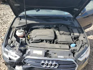 2018 Audi A3 Premium z VIN WAUB8GFFXJ1026829, wystawiony jako Copart lot #54714695 z przebiegiem 61 807 mil mil oraz Szkody całkowita. Historia ofert i sprzedaży dostępna na DreamBid. Obrazek 11.