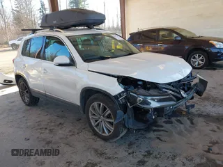 2013 Volkswagen Tiguan SE z VIN WVGBV7AX9DW545241, wystawiony jako IAAI lot #41417716 z przebiegiem 165 357 mil mil oraz . Historia ofert i sprzedaży dostępna na DreamBid. Obrazek 1.