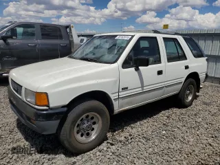 1992 Isuzu Rodeo z VIN 4S2CY58Z4N4308640, wystawiony jako Copart lot #70823954 z przebiegiem 227 927 mil mil oraz Szkody całkowita. Historia ofert i sprzedaży dostępna na DreamBid. Obrazek 1.