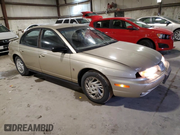 1999 Saturn SL z VIN 1G8ZK5277XZ266298, wystawiony jako Copart lot #41371855 z przebiegiem 85 882 mil mil oraz Szkoda całkowita • Salvage title. Historia ofert i sprzedaży dostępna na DreamBid. Obrazek 4.