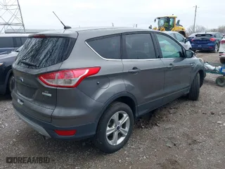 2013 Ford Escape SE with VIN 1FMCU0GX3DUD34621, listed as a IAAI auction lot 41967920 with 149,437 mi miles. Bid and sale history available at carsss.com. Image 4.
