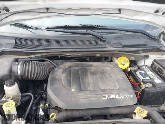 2014 Dodge Grand Caravan SE with VIN 2C4RDGBG9ER283848, listed as a IAAI auction lot 41666021 with 120,351 mi miles and . Bid and sale history available at DreamBid. Image 10.