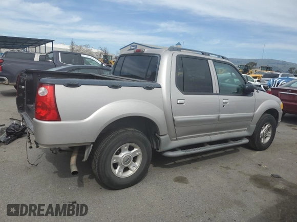 2003 Ford Explorer Sport Trac XLS with VIN 1FMZU67E33UA26245, listed as a Copart auction lot 47224405 with 113,009 mi miles and Salvage title. Bid and sale history available at DreamBid. Image 3.