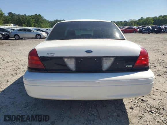 2010 Ford Police Interceptor with VIN 2FABP7BV7AX140870, listed as a Copart auction lot 53457275 with 124,194 mi miles and Salvage title. Bid and sale history available at DreamBid. Image 6.