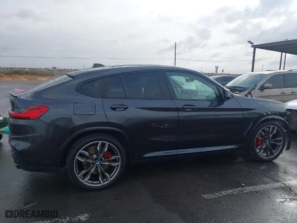 2021 BMW X4 M40i with VIN 5UX2V5C0XM9E16773, listed as a IAAI auction lot 41230634 with 52,779 mi miles. Bid and sale history available at carsss.com. Image 14.