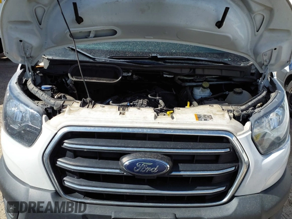 2020 Ford Transit Cargo with VIN 1FTYE1YG7LKB68822, listed as a IAAI auction lot 41798263 with 79,896 mi miles and . Bid and sale history available at DreamBid. Image 10.