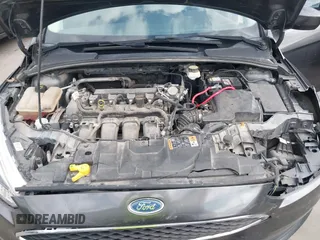 2018 Ford Focus SE with VIN 1FADP3F22JL295342, listed as a IAAI auction lot 42335881 with 77,464 mi miles and . Bid and sale history available at DreamBid. Image 10.