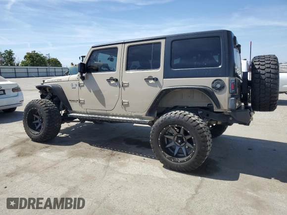 2016 Jeep Wrangler Unlimited Rubicon z VIN 1C4HJWFGXGL236560, wystawiony jako Copart lot #57528355 z przebiegiem 64 634 mil mil oraz Szkoda całkowita • Salvage title. Historia ofert i sprzedaży dostępna na DreamBid. Obrazek 2.