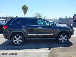 2012 Jeep Grand Cherokee Overland with VIN 1C4RJFCT7CC185602, listed as a IAAI auction lot 42018715 with 91,507 mi miles. Bid and sale history available at carsss.com. Image 13.