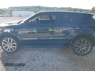 2012 Land Rover Range Rover Evoque Dynamic Premium z VIN SALVT1BG3CH625813, wystawiony jako IAAI lot #40424001 z przebiegiem 76 584 mil mil oraz . Historia ofert i sprzedaży dostępna na DreamBid. Obrazek 14.