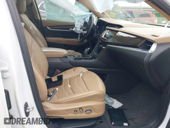 2021 Cadillac XT6 Premium Luxury with VIN 1GYKPFRS0MZ100879, listed as a IAAI auction lot 41083030 with 56,502 mi miles and . Bid and sale history available at DreamBid. Image 5.