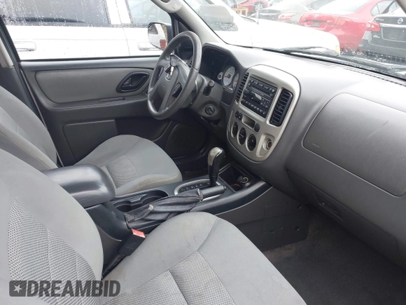 2007 Ford Escape XLT with VIN 1FMYU03197KB80133, listed as a IAAI auction lot 41084715 with 185,132 mi miles and . Bid and sale history available at DreamBid. Image 5.