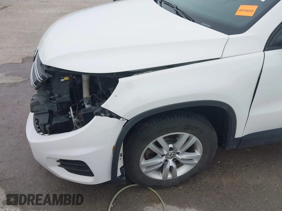 2013 Volkswagen Tiguan S z VIN WVGAV3AX6DW610678, wystawiony jako IAAI lot #41544865 z przebiegiem 102 948 mil mil oraz . Historia ofert i sprzedaży dostępna na DreamBid. Obrazek 18.