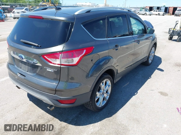 2015 Ford Escape Titanium z VIN 1FMCU9J92FUB01007, wystawiony jako IAAI lot #42319246 z przebiegiem 90 782 mil mil oraz . Historia ofert i sprzedaży dostępna na DreamBid. Obrazek 4.
