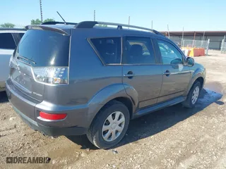 2012 Mitsubishi Outlander ES with VIN JA4AS2AWXCU002066, listed as a IAAI auction lot 42084033 with 160,597 mi miles. Bid and sale history available at carsss.com. Image 4.