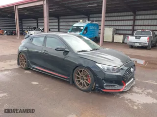 2020 Hyundai Veloster N with VIN KMHT36AHOLU003582, listed as a IAAI auction lot 40958146 with 33,943 mi miles. Bid and sale history available at carsss.com. Image 1.