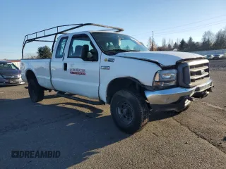 2002 Ford F-350 XL with VIN 1FTSX31S72ED14126, listed as a Copart auction lot 82688484 with 202,780 mi miles and Salvage Title. Bid and sale history available at DreamBid. Image 4.