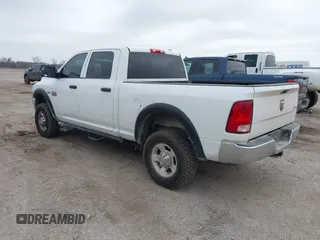 2012 Ram 2500 ST with VIN 3C6TD5CT1CG113340, listed as a IAAI auction lot 41517671 with 196,799 mi miles. Bid and sale history available at carsss.com. Image 3.