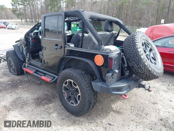 2015 Jeep Wrangler Unlimited Rubicon z VIN 1C4BJWFG7FL711036, wystawiony jako IAAI lot #41604648 z przebiegiem 167 678 mil mil oraz . Historia ofert i sprzedaży dostępna na DreamBid. Obrazek 3.