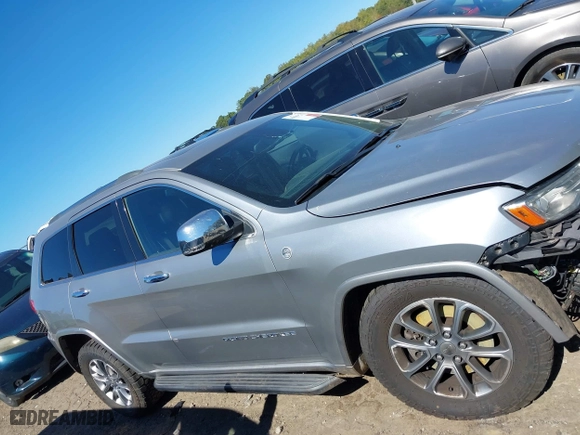 2014 Jeep Grand Cherokee Overland with VIN 1C4RJFCM4EC316142, listed as a IAAI auction lot 40607061 with 195,008 mi miles. Bid and sale history available at carsss.com. Image 12.