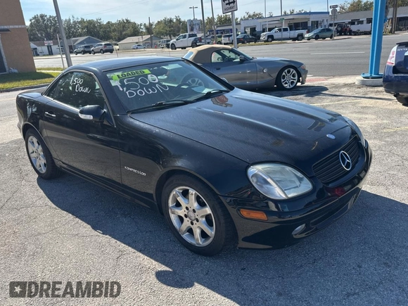 2002 Mercedes-Benz SLK-Class 2.3L Kompressor with VIN WDBKK49FX2F265220, listed as a Copart auction lot 84038354 with 90,860 mi miles and Clean Title. Bid and sale history available at carsss.com. Image 1.