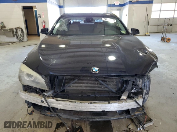 2011 BMW 7 Series 740i with VIN WBAKA4C53BC392488, listed as a Copart auction lot 77876674 with 0 mi miles and Salvage Title. Bid and sale history available at carsss.com. Image 5.