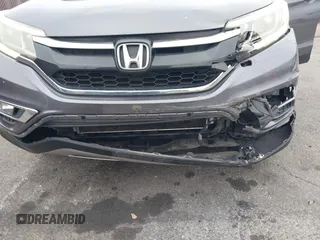 2015 Honda CR-V EX with VIN 3CZRM3H51FG704087, listed as a IAAI auction lot 42074521 with 74,610 mi miles and . Bid and sale history available at carsss.com. Image 6.
