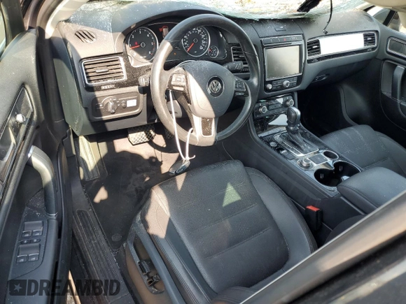 2015 Volkswagen Touareg Lux с VIN WVGEP9BP6FD003059, выставлен на аукционе Copart как лот 59670505 с пробегом 162 945 миль миль и Списание • Salvage title. История ставок и продаж доступна на DreamBid. Изображение 8.