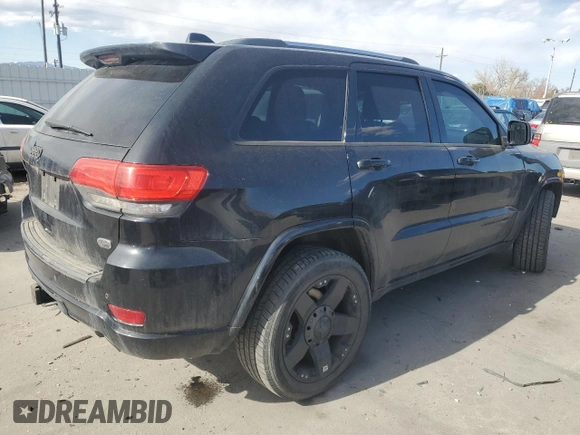 2014 Jeep Grand Cherokee Overland with VIN 1C4RJFCT2EC106002, listed as a Copart auction lot 48763675 with 143,011 mi miles and Salvage Title. Bid and sale history available at DreamBid. Image 3.