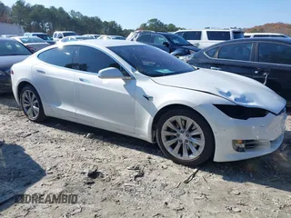 2016 Tesla Model S 70 with VIN 5YJSA1E16GF164264, listed as a IAAI auction lot 40976293 with 68,940 mi miles and . Bid and sale history available at DreamBid. Image 13.
