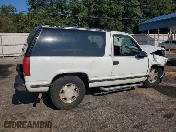 1995 GMC Yukon with VIN 1GKEK18K2SJ700616, listed as a Copart auction lot 68582034 with 205,980 mi miles and Salvage Title. Bid and sale history available at carsss.com. Image 3.