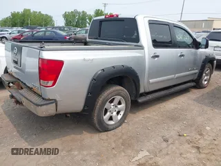 2006 Nissan Titan SE with VIN 1N6AA07BX6N562442, listed as a IAAI auction lot 42411727 with 203,862 mi miles and . Bid and sale history available at DreamBid. Image 4.