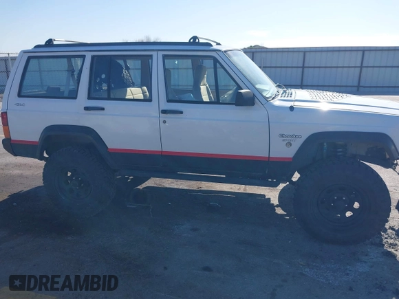 1995 Jeep Cherokee Sport with VIN 1J4FJ68S1SL576255, listed as a IAAI auction lot 42178902 with 214,041 mi miles and . Bid and sale history available at DreamBid. Image 13.