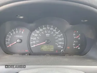 2005 Kia Spectra with VIN KNAFE161555082073, listed as a Copart auction lot 77062804 with 173,387 mi miles and Salvage Title. Bid and sale history available at carsss.com. Image 9.