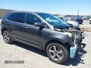 2019 Ford Edge SEL z VIN 2FMPK3J90KBC63321, wystawiony jako IAAI lot #42269665 z przebiegiem 85 670 mil mil oraz . Historia ofert i sprzedaży dostępna na DreamBid. Obrazek 1.