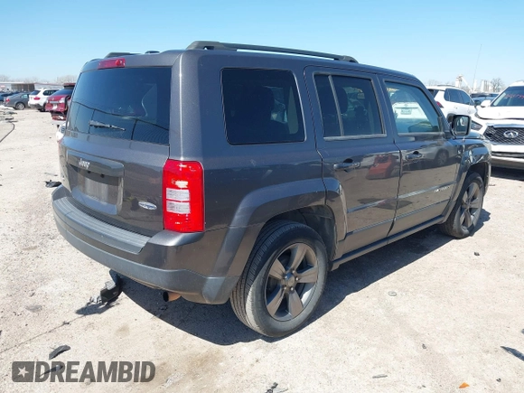 2014 Jeep Patriot Latitude with VIN 1C4NJPFA3ED928123, listed as a IAAI auction lot 41767231 with 136,318 mi miles and . Bid and sale history available at carsss.com. Image 4.