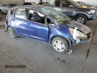 2009 Honda Fit with VIN JHMGE872X9S036722, listed as a Copart auction lot 64701315 with 197,305 mi miles and Non repairable. Bid and sale history available at DreamBid. Image 4.