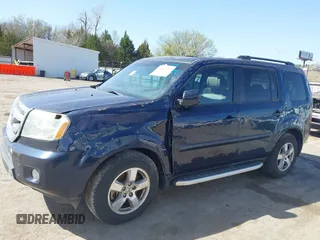 2011 Honda Pilot EX-L with VIN 5FNYF4H6XBB022917, listed as a IAAI auction lot 41864215 with 36,923 mi miles and . Bid and sale history available at carsss.com. Image 14.
