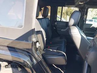 2016 Jeep Wrangler Unlimited Sport with VIN 1C4BJWDG1GL226069, listed as a IAAI auction lot 41003276 with 88,015 mi miles and . Bid and sale history available at DreamBid. Image 8.